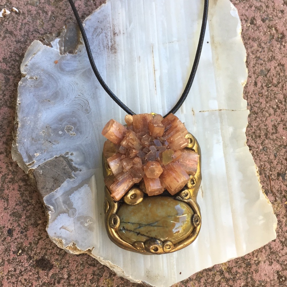 Star aragonite and natural brown gold pendant